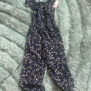 Brand new girls romper, runs small.